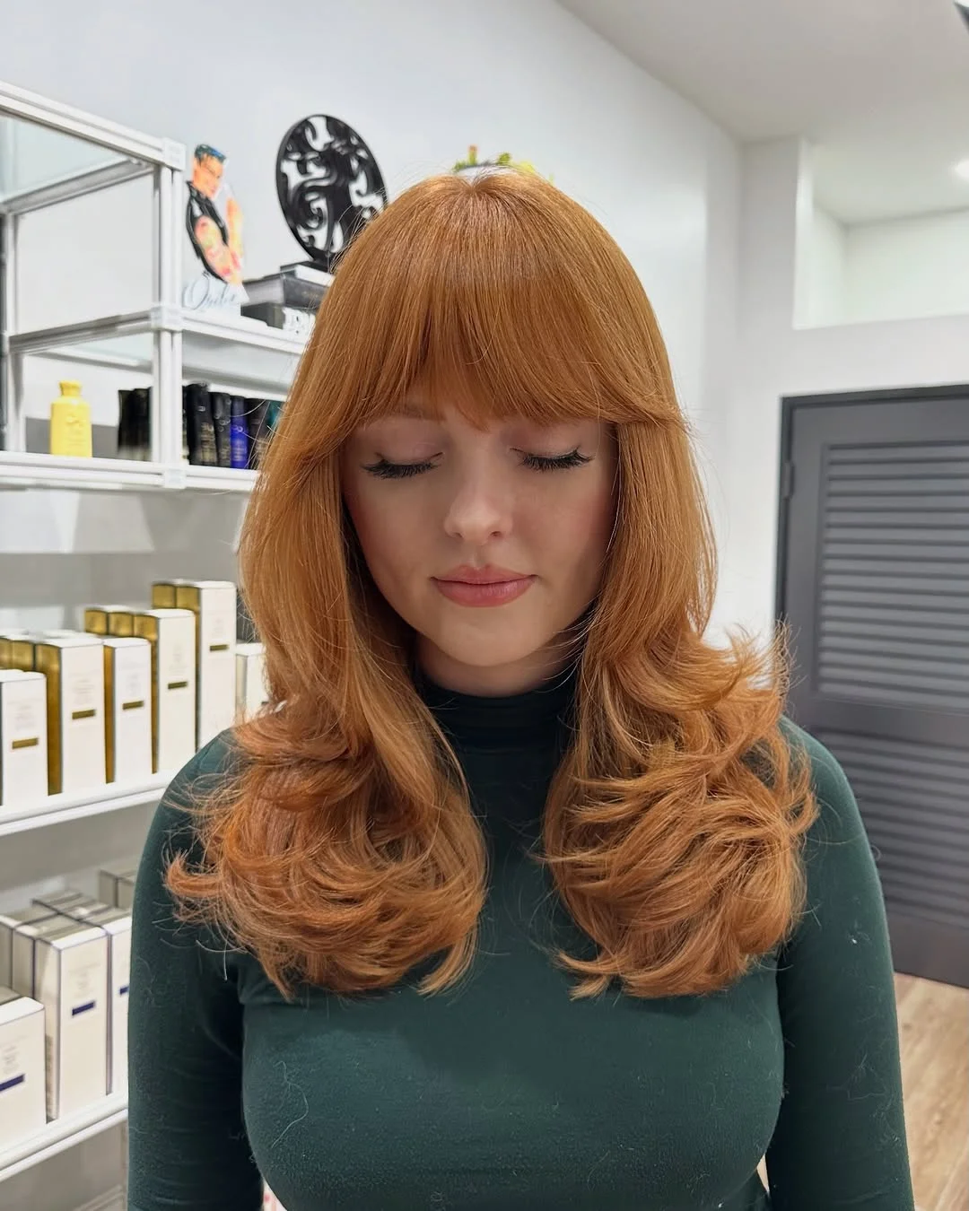 copper summer hair color for light skin 2026 Golden Peach Copper Blowout With Feathered Volume