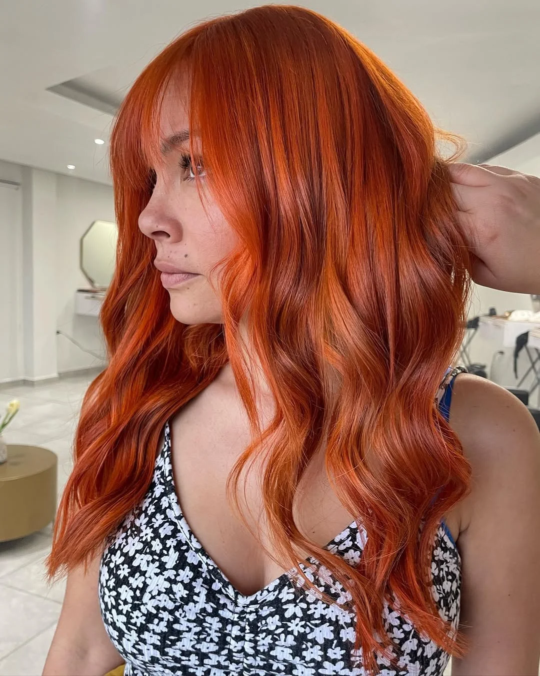copper summer hair color for light skin 2026 Burnished Copper Waves With Soft Fringe Detail