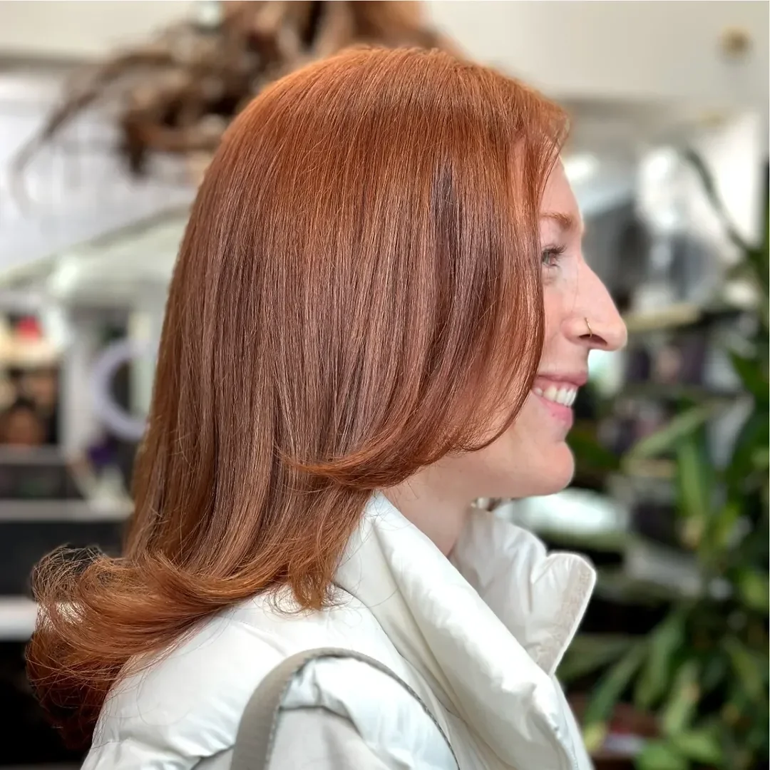 effortless summer haircuts for fuller faces 2026 Soft Copper Blowout With Curled Under Ends