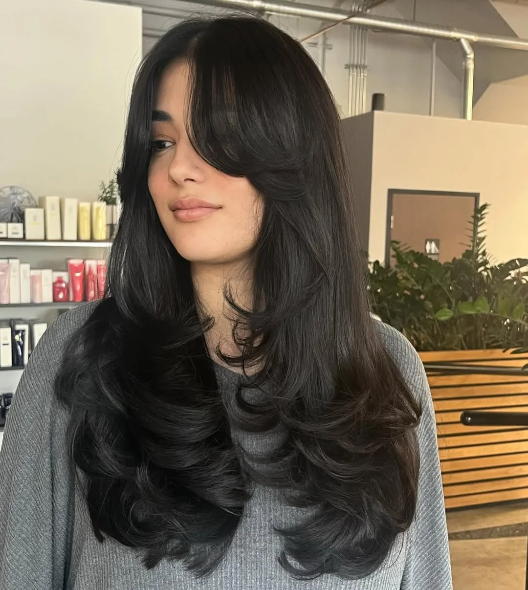 effortless summer haircuts for fuller faces 2026 Polished Jet Black Layers With Soft Volume