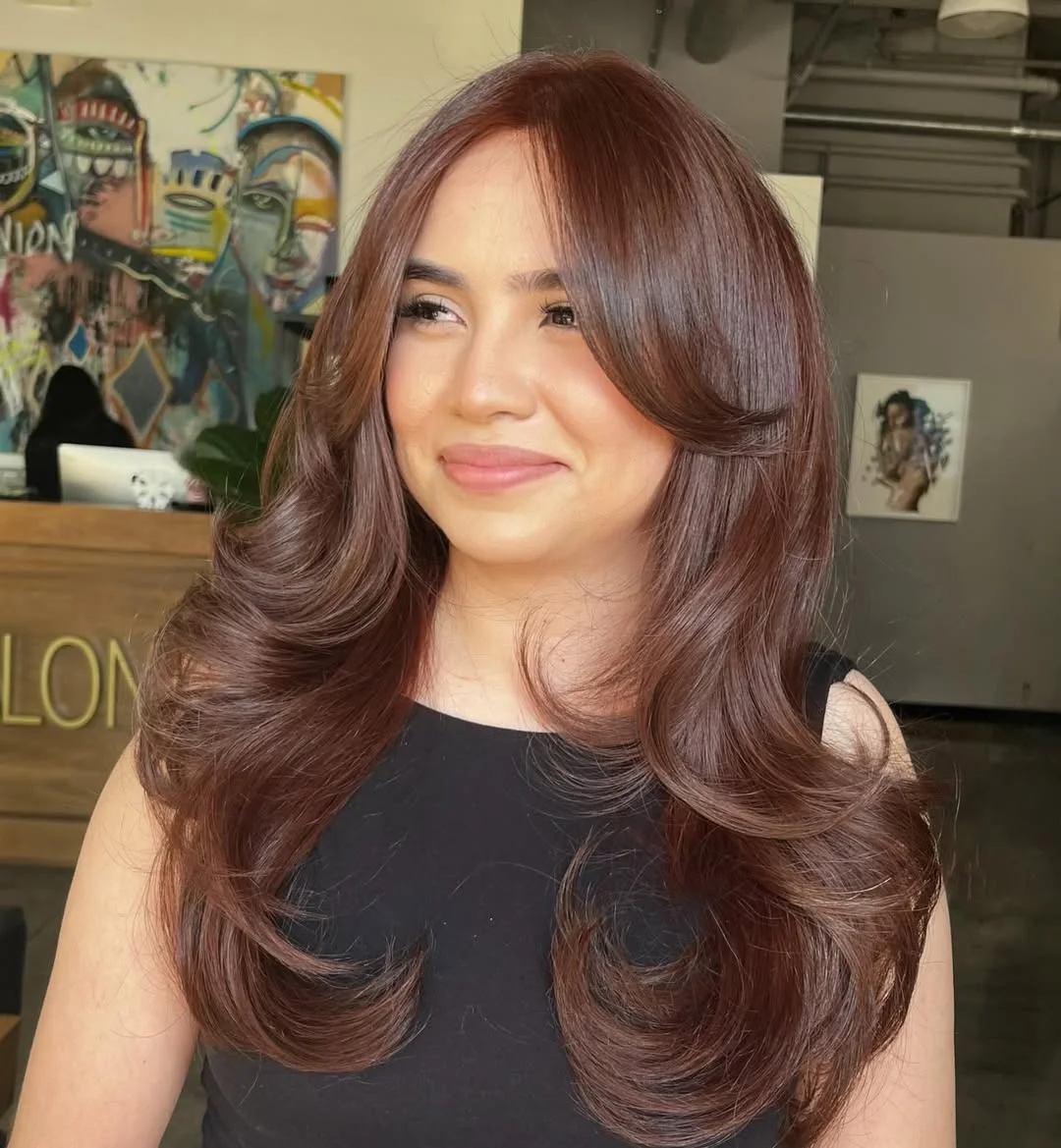 effortless summer haircuts for fuller faces 2026 Rich Cinnamon Layers With Bouncy Volume