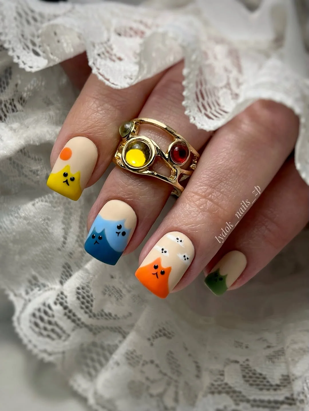 funky summer nails 2026 Playful Cartoon Cats in Rainbow Colors