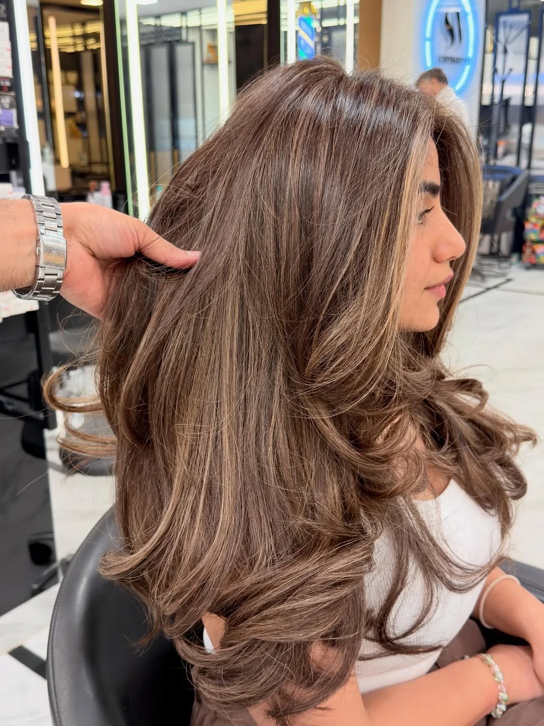 glossy summer hair color for brown skin 2026 Velvet Beige Brunette With Soft Curtain Layers