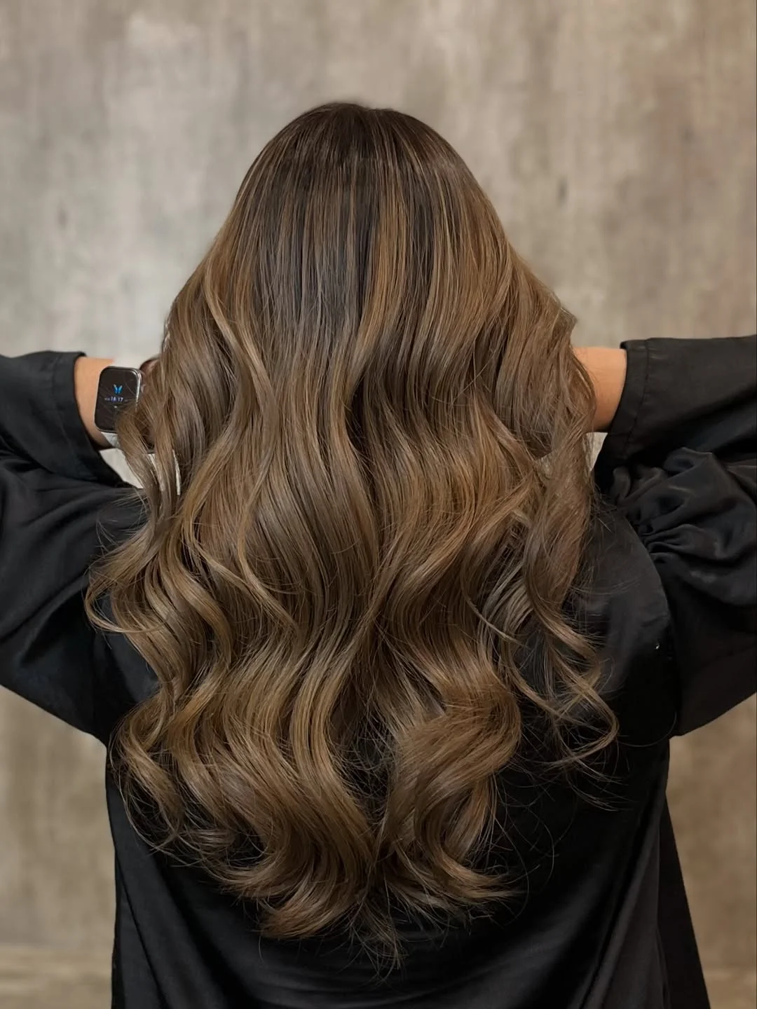 glossy summer hair color for brown skin 2026 Mocha Ribbon Waves With Smoky Dimension