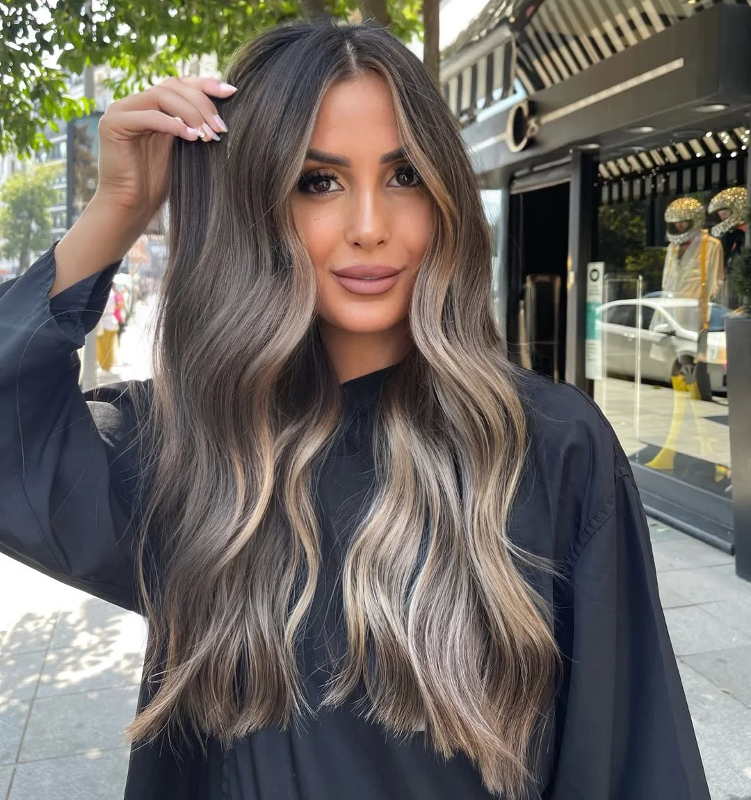 glossy summer hair color for brown skin 2026 Cool Mushroom Balayage With Bright Face-Framing Ribbons