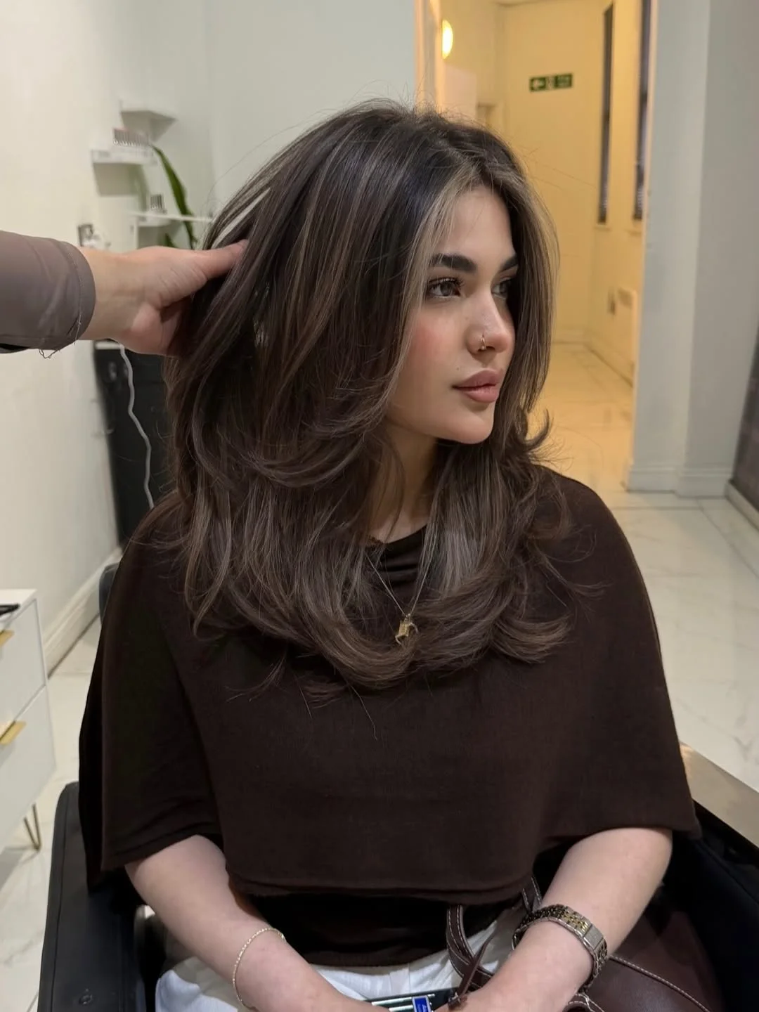 glossy summer hair color for brown skin 2026 Rich Espresso Layers With Airy Face-Framing Lightness