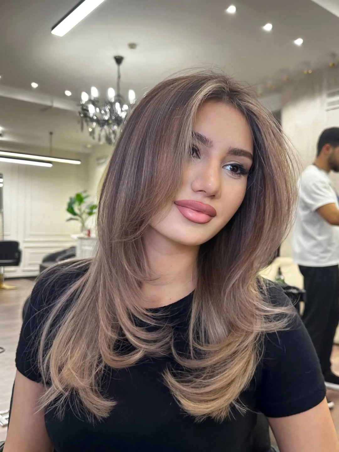 glossy summer hair color for brown skin 2026 Smoky Latte Brunette With Airy Blowout Volume
