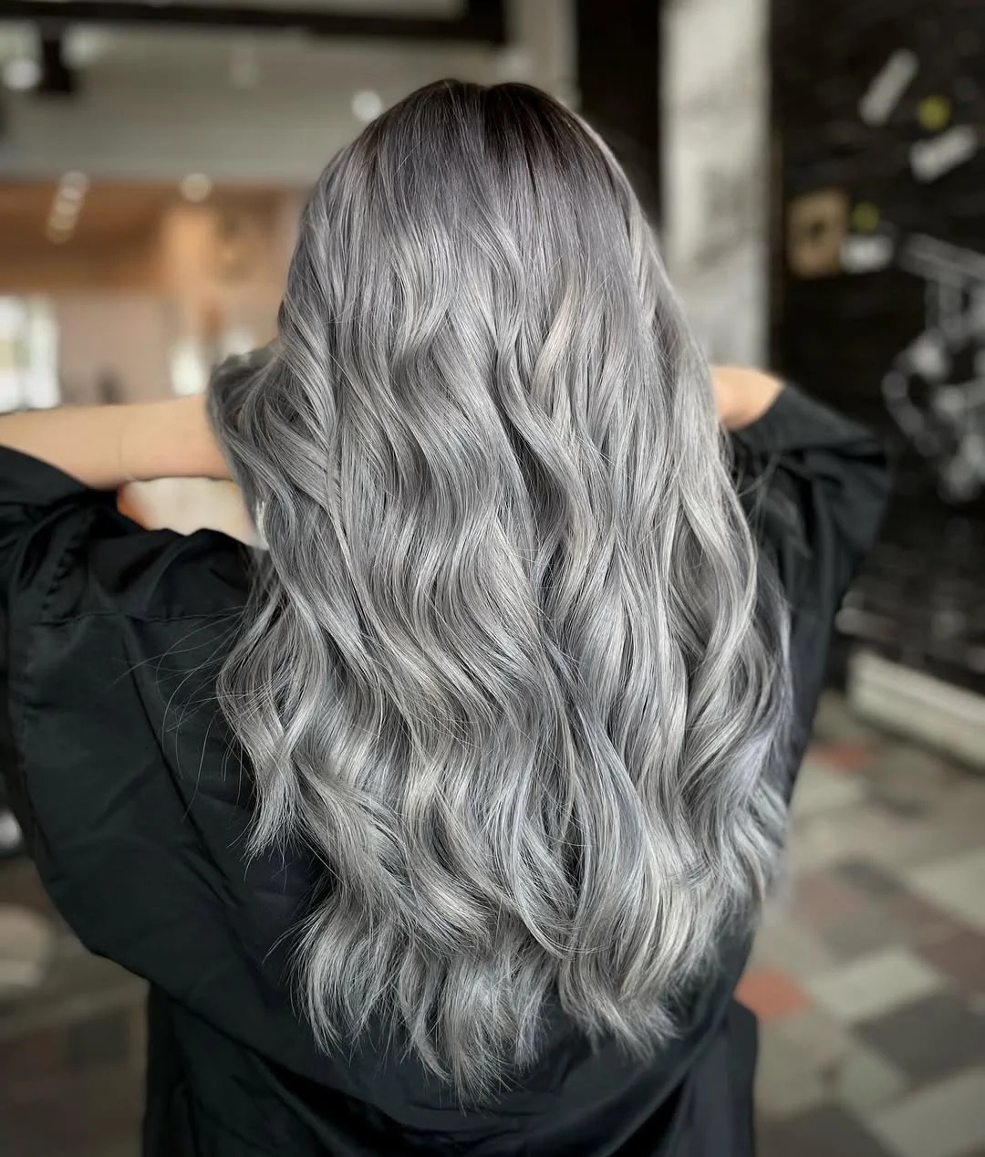 light summer ash blonde hair color 2026 Deep Smoky Silver Ash Blonde With Dimensional Waves