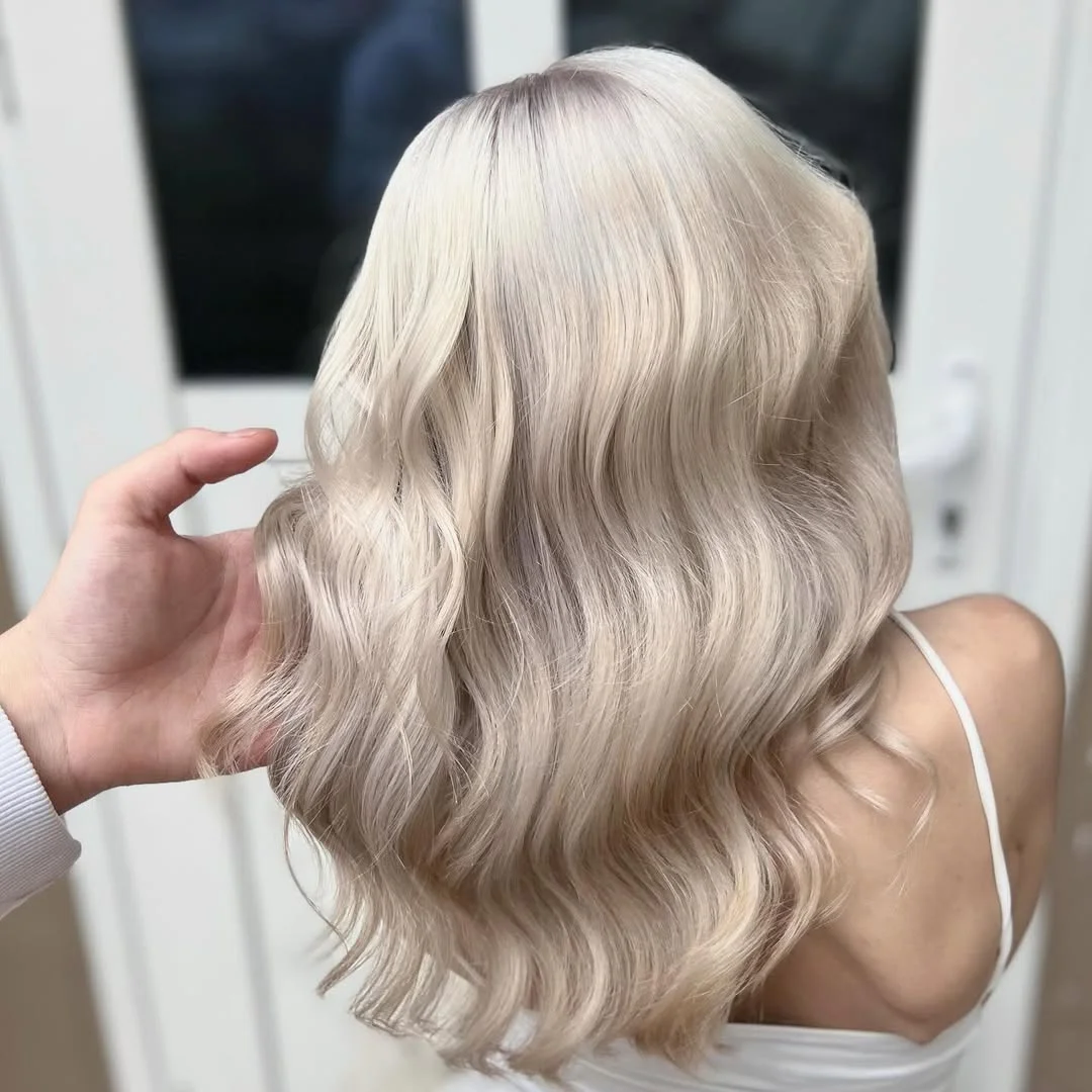 light summer ash blonde hair color 2026 Soft Pearl Ash Blonde Waves With Creamy Dimension