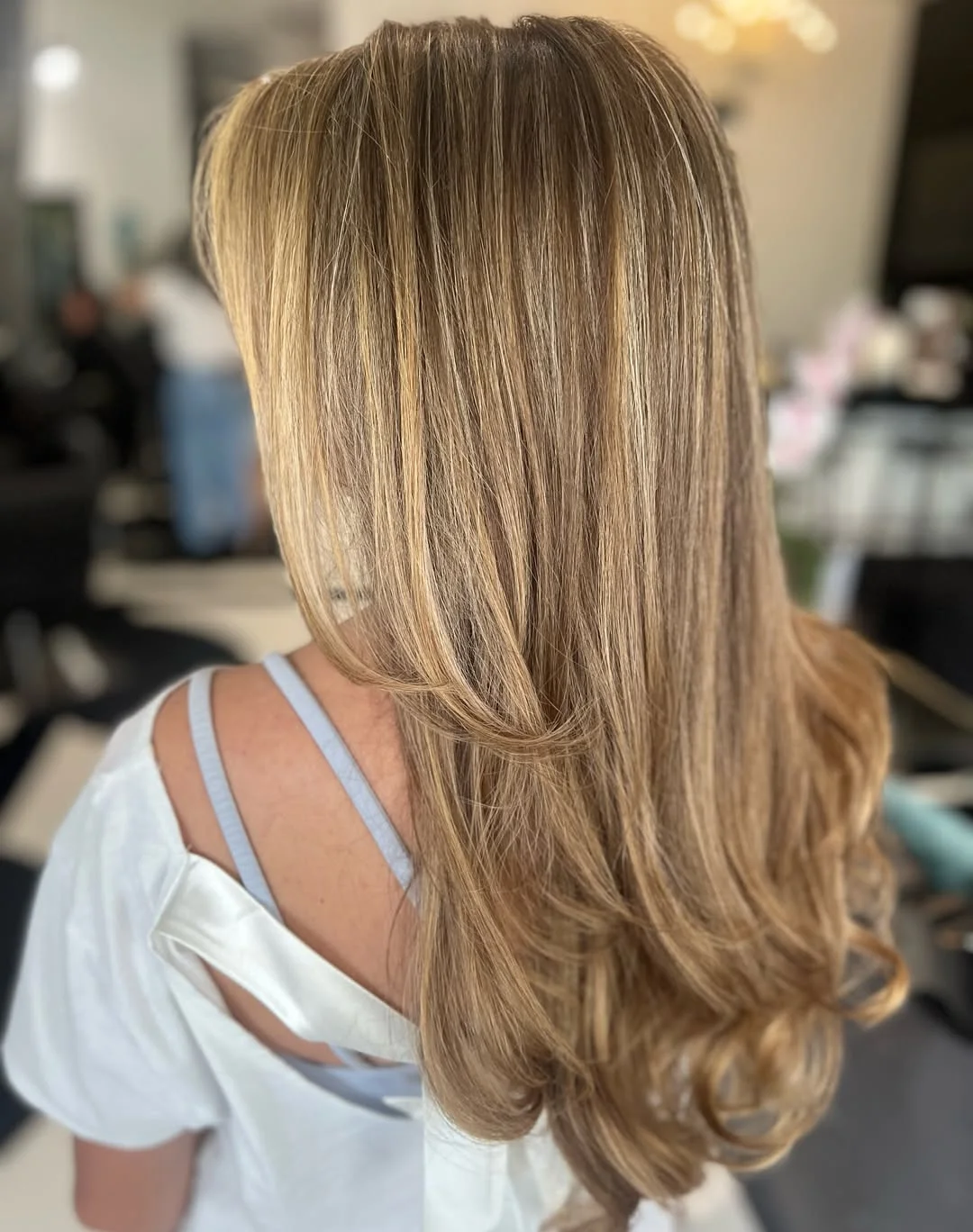 light summer honey blonde hair color 2026 Polished Honey Layers with Silky Volume