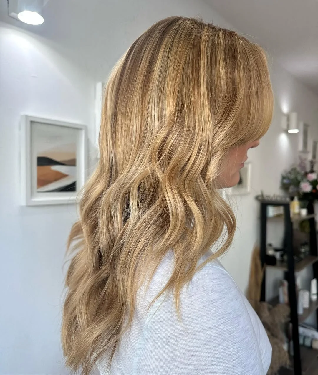light summer honey blonde hair color 2026 Warm Honey Waves with Feathered Summer Layers