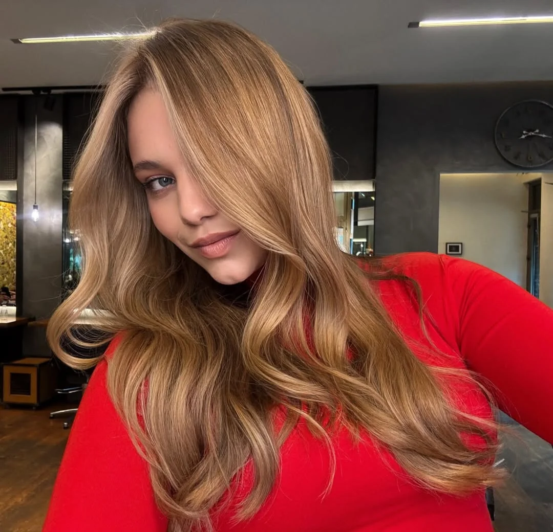 light summer honey blonde hair color 2026 Warm Honey Brunette Blend with Soft Glam Waves