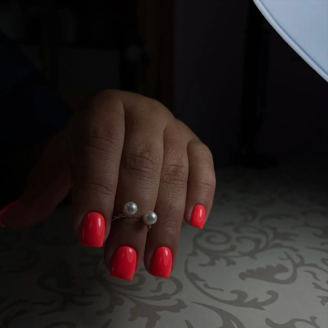 light summer nails 2026 Hot Coral Gloss Nails That Never Stop Feeling Fresh