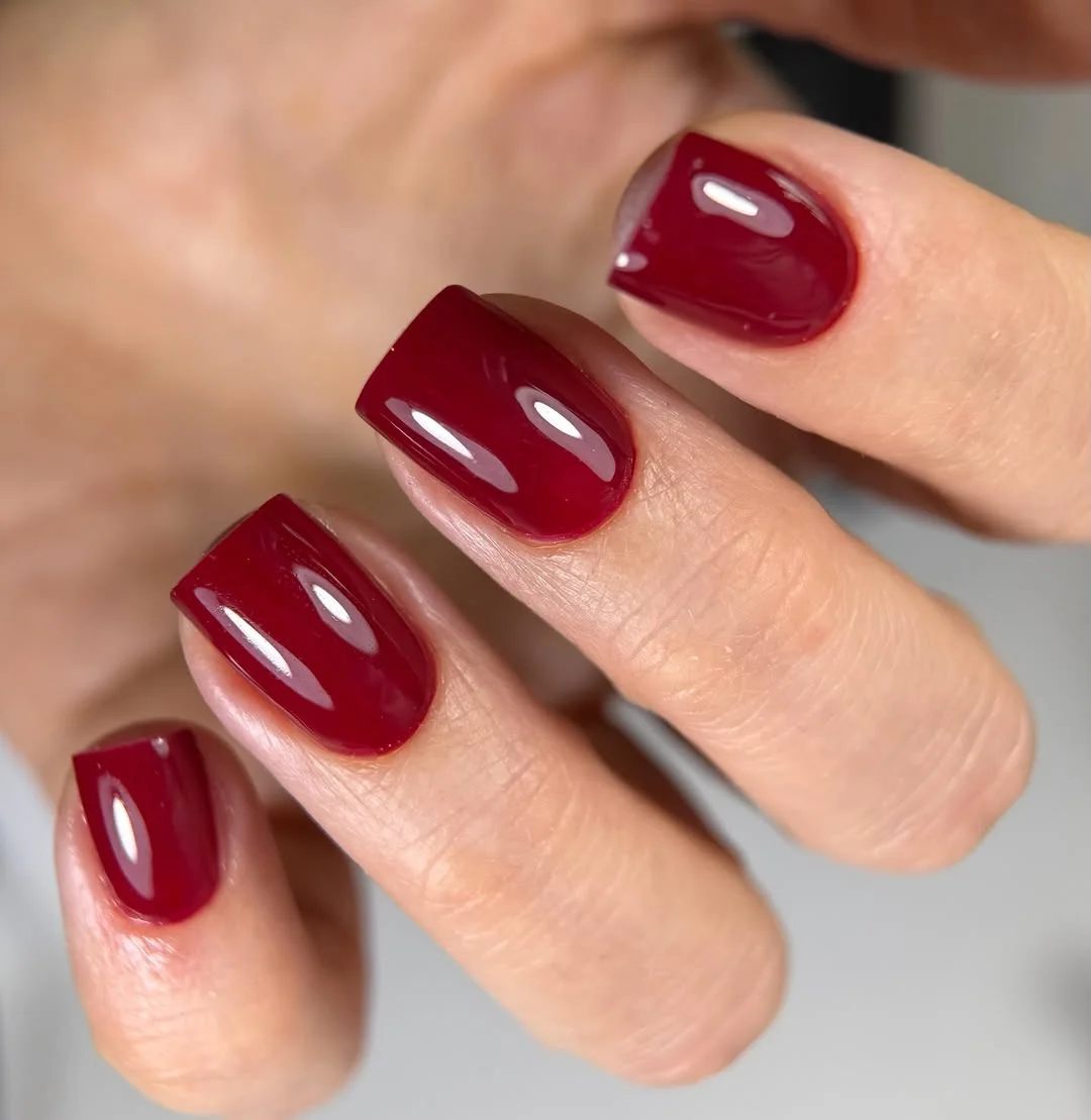 light summer nails 2026 Cherry Red Nails With a Soft Glassy Finish