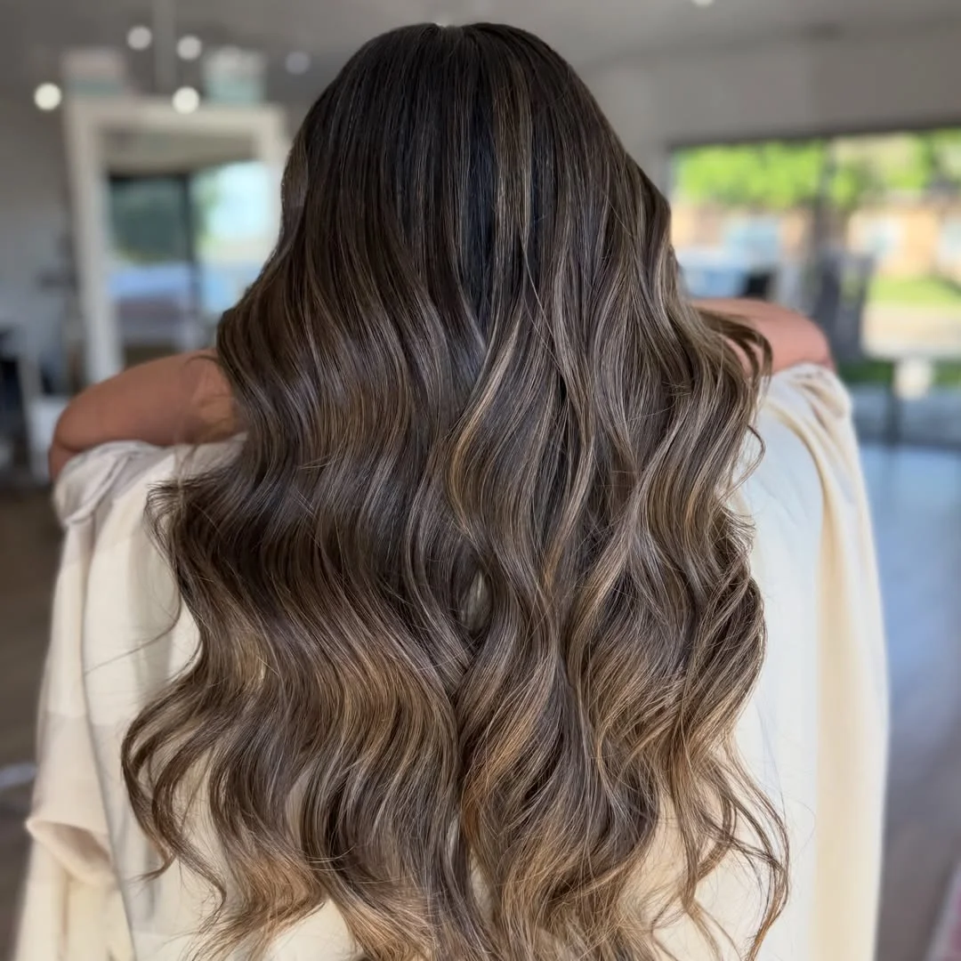 lived-in summer ash brown hair color 2026 Dark Ash Balayage With Golden Summer Contrast