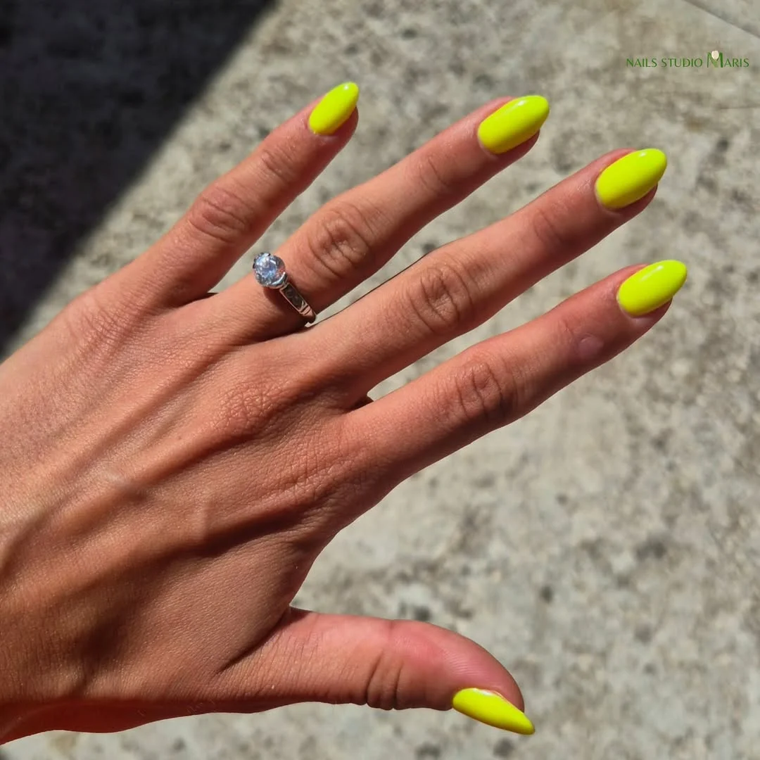 neon summer nails 2026 Electric Yellow Almond Nails That Glow In Sunlight