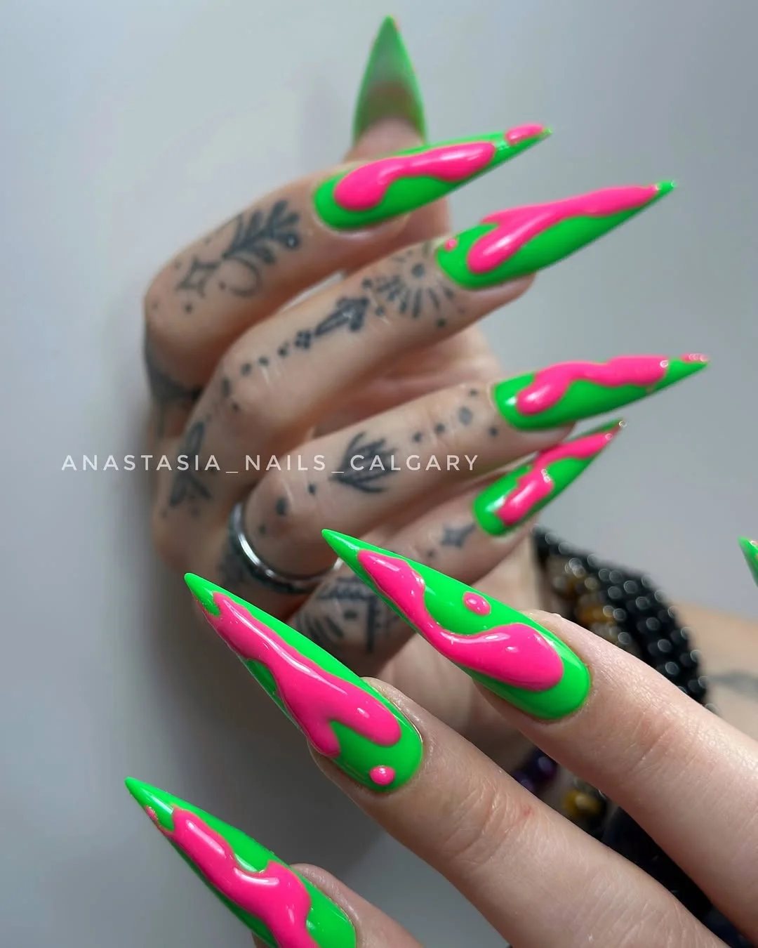 neon summer nails 2026 Hot Pink And Green Drip Nails With Maximalist Energy
