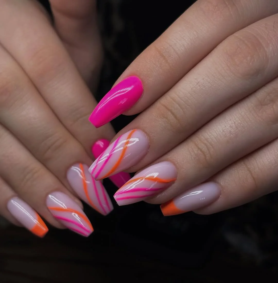 neon summer nails 2026 Soft Pink Coffin Nails With Neon Orange Line Art