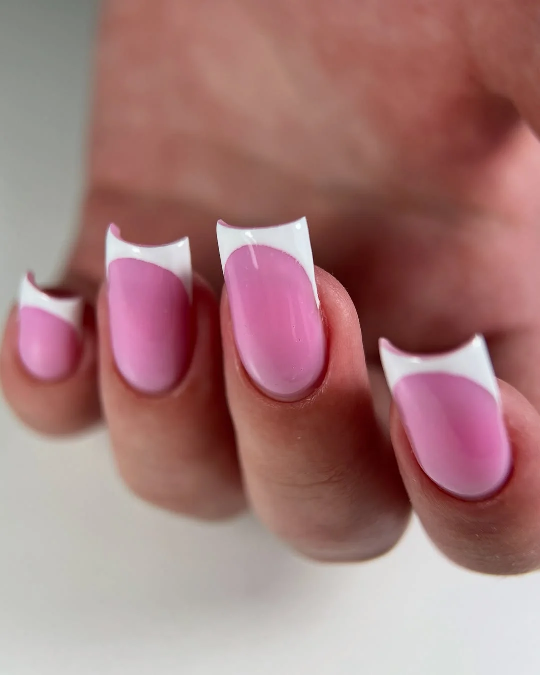 pink summer nails 2026 White And Pink Curved French Tips