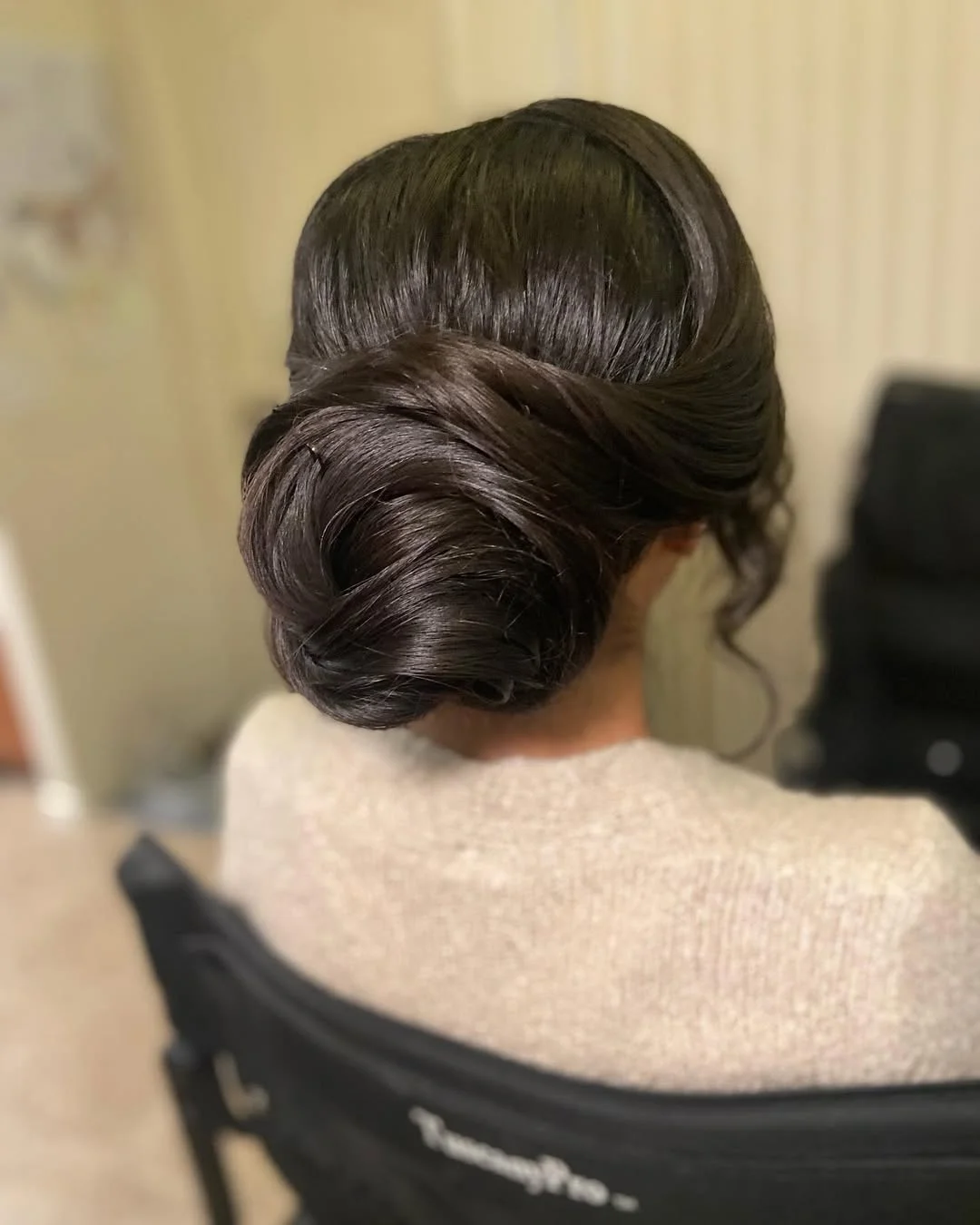 quick summer bun hairstyles 2026 Classic Dark Espresso Bun With Elegant Vintage Shape