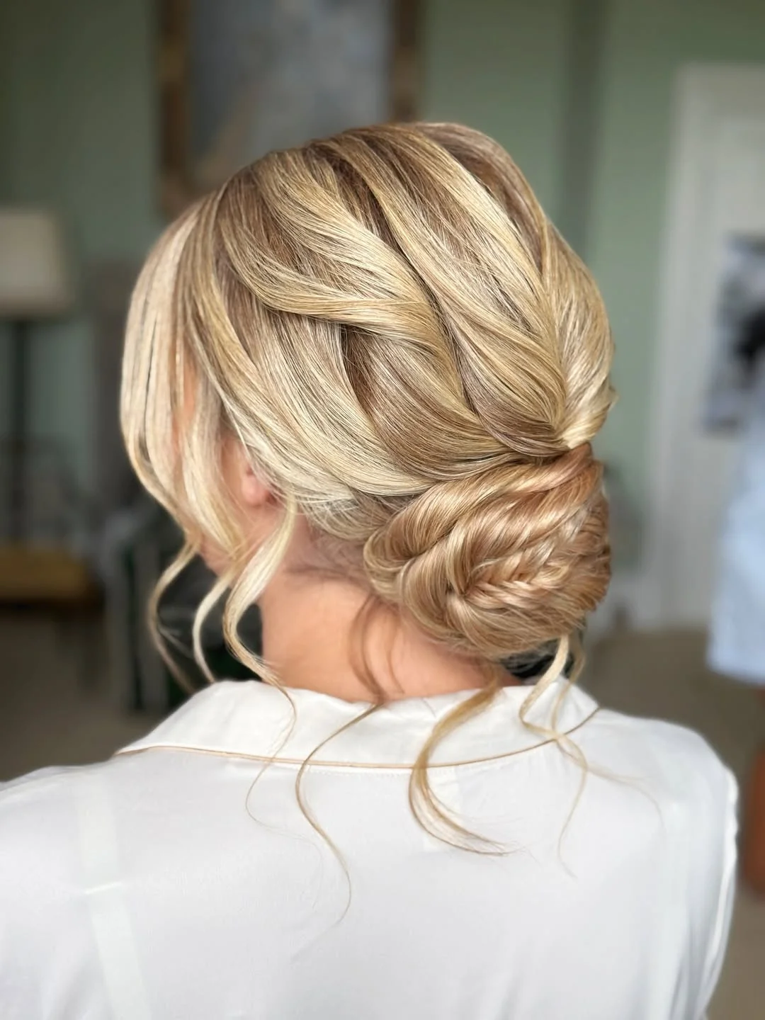 quick summer bun hairstyles 2026 Twisted Low Blonde Bun With Elegant Braided Texture