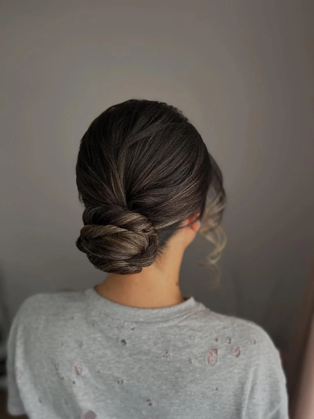 quick summer bun hairstyles 2026 Minimal Twisted Low Bun For Everyday Elegance