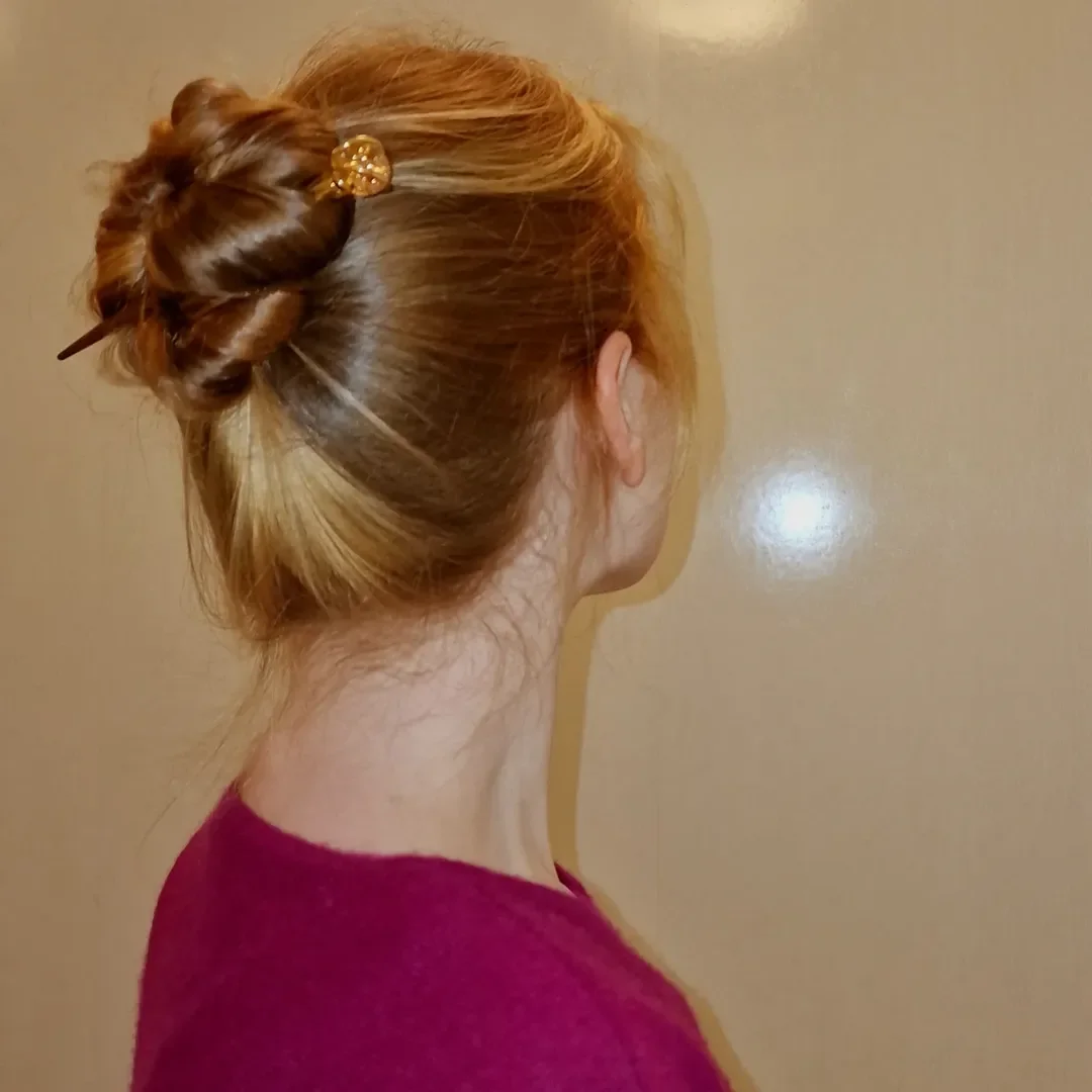 quick summer bun hairstyles 2026 Minimal Twisted Top Knot That Takes Five Minutes