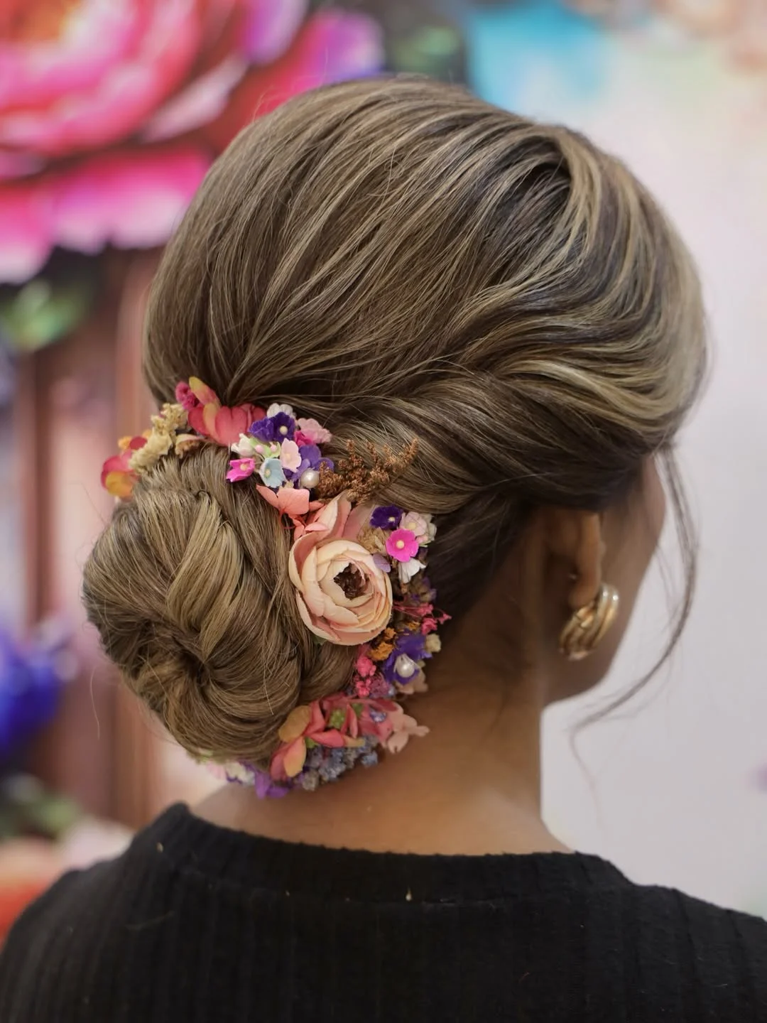 quick summer bun hairstyles 2026 Garden Party Bun With Delicate Floral Accents