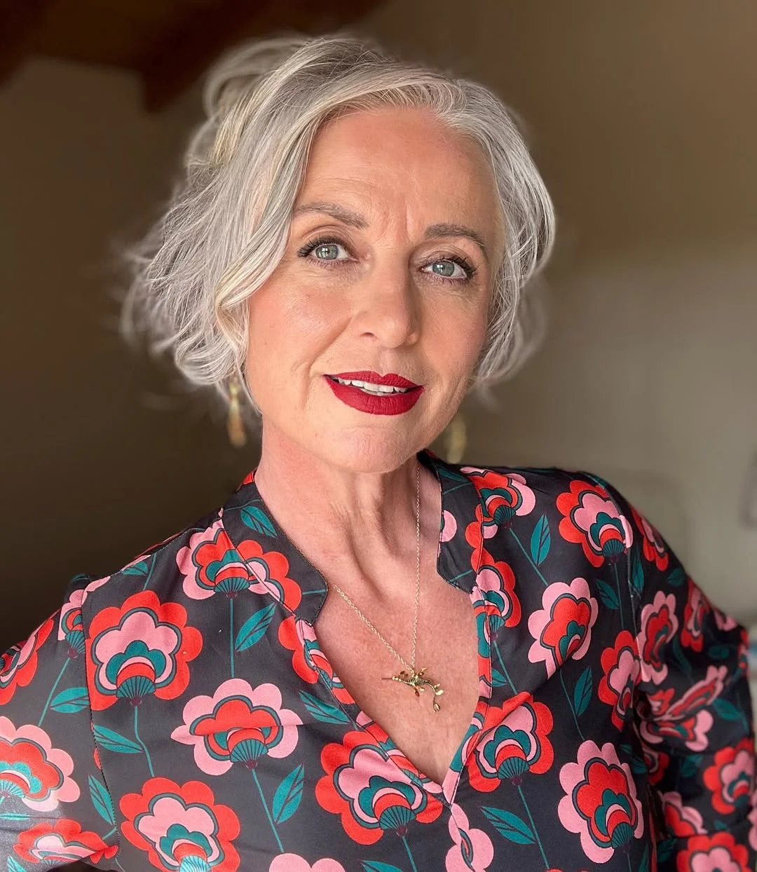 refined summer haircuts for women over 60 2026 Soft Silver Waves With a Modern French Feel