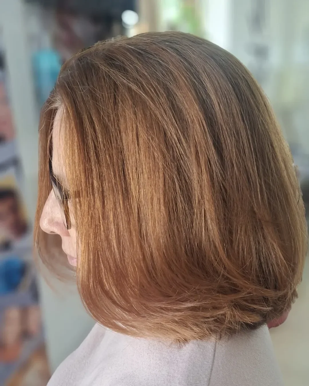 refined summer haircuts for women over 60 2026 Soft Copper Layers With Elegant Summer Movement
