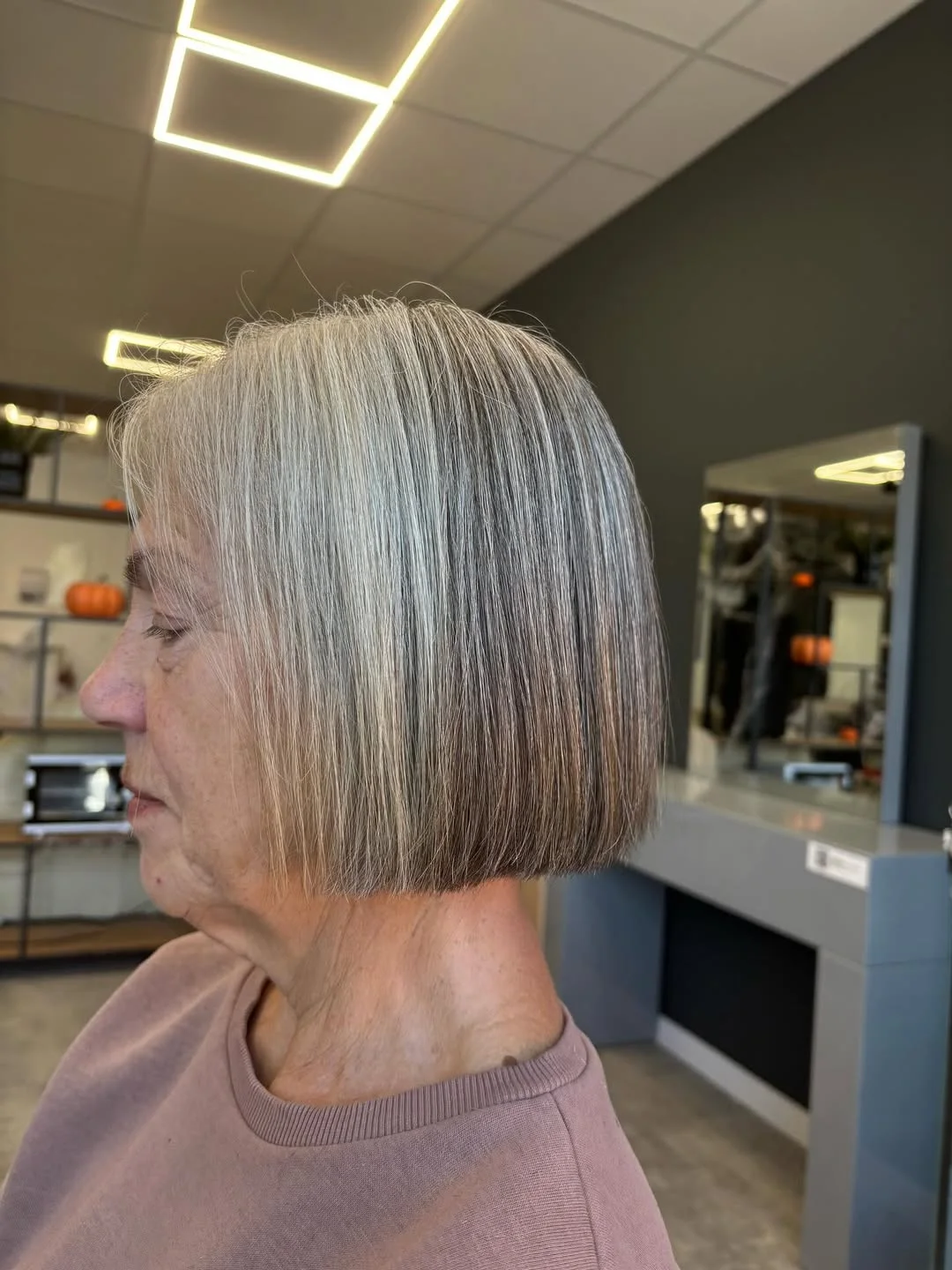 refined summer haircuts for women over 60 2026 Sleek Silver Precision Bob With Minimalist Lines