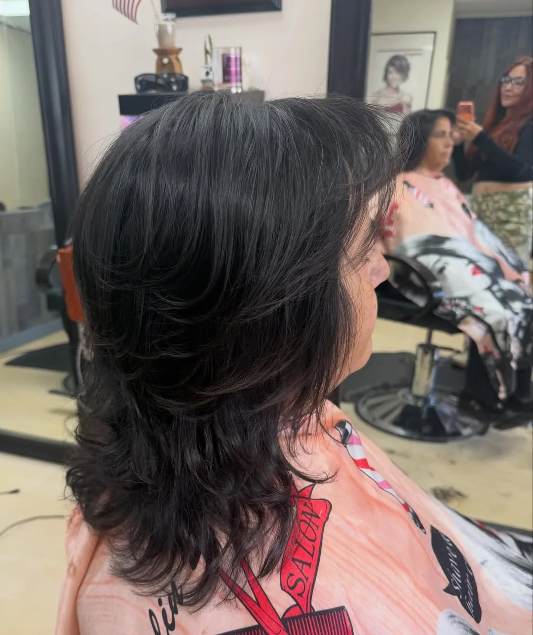 refined summer haircuts for women over 60 2026 Layered Black Medium Cut With Soft Volume