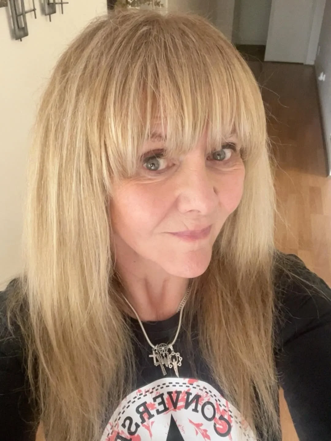 refined summer haircuts for women over 60 2026 Long Feathered Blonde Layers With Soft Fringe
