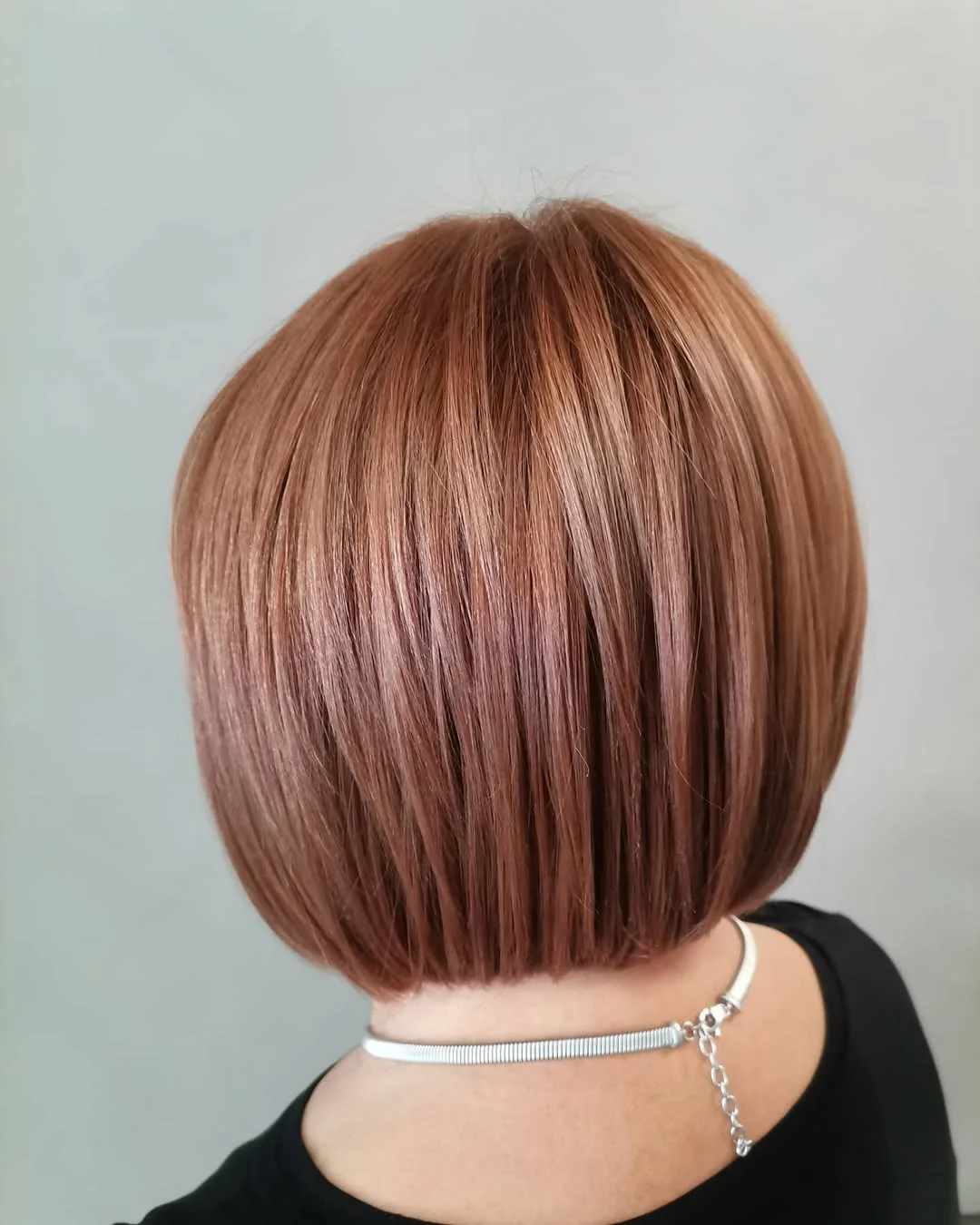 refined summer haircuts for women over 60 2026 Rounded Cinnamon Bob With Soft Precision