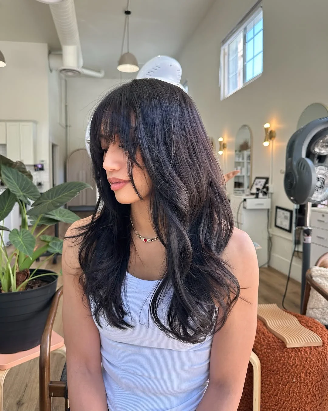 salon summer haircuts for medium hair 2026 Soft Shag with Airy Bangs and Natural Movement