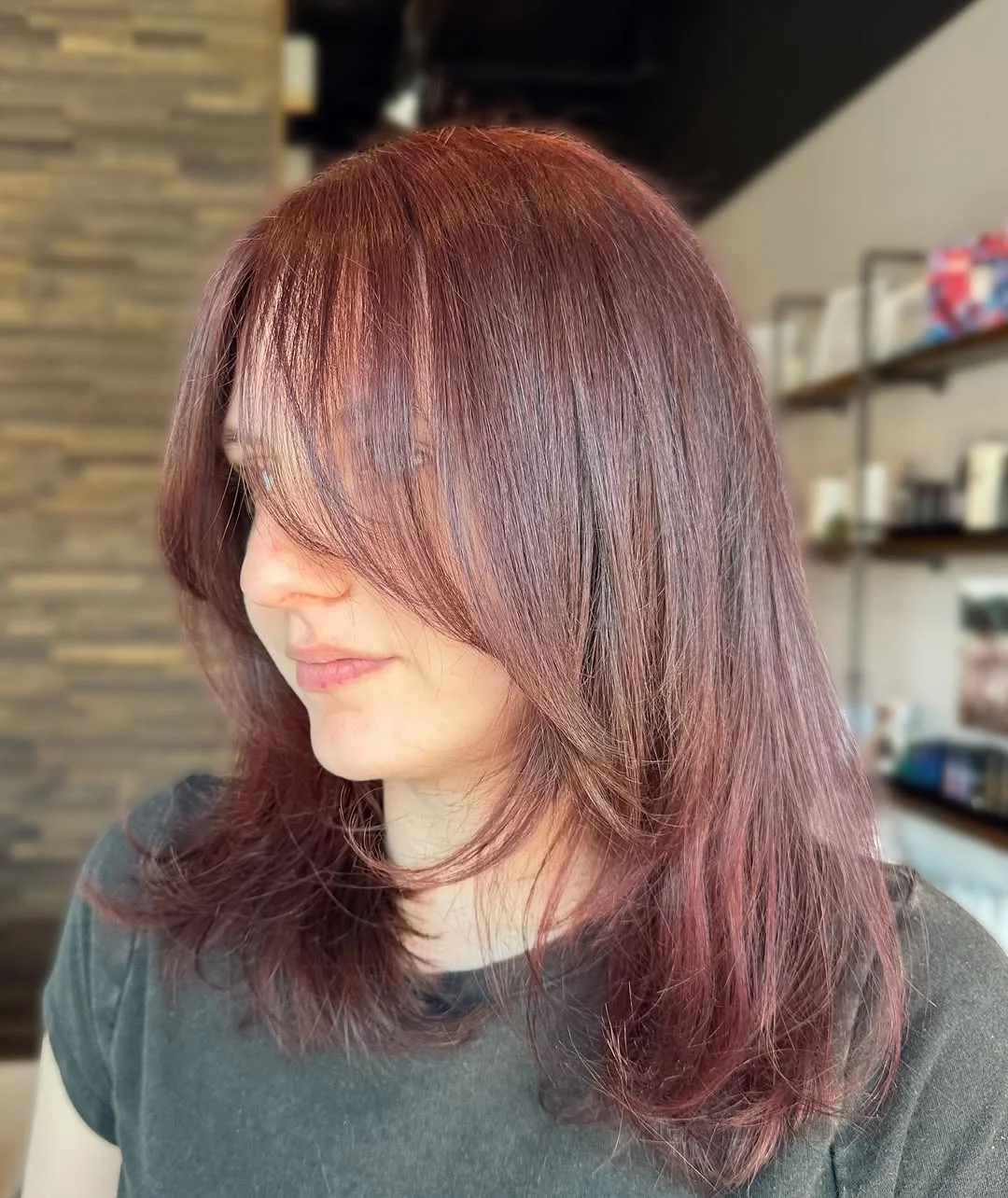 salon summer haircuts for medium hair 2026 Glossy Cherry Brunette with Feathered Layers