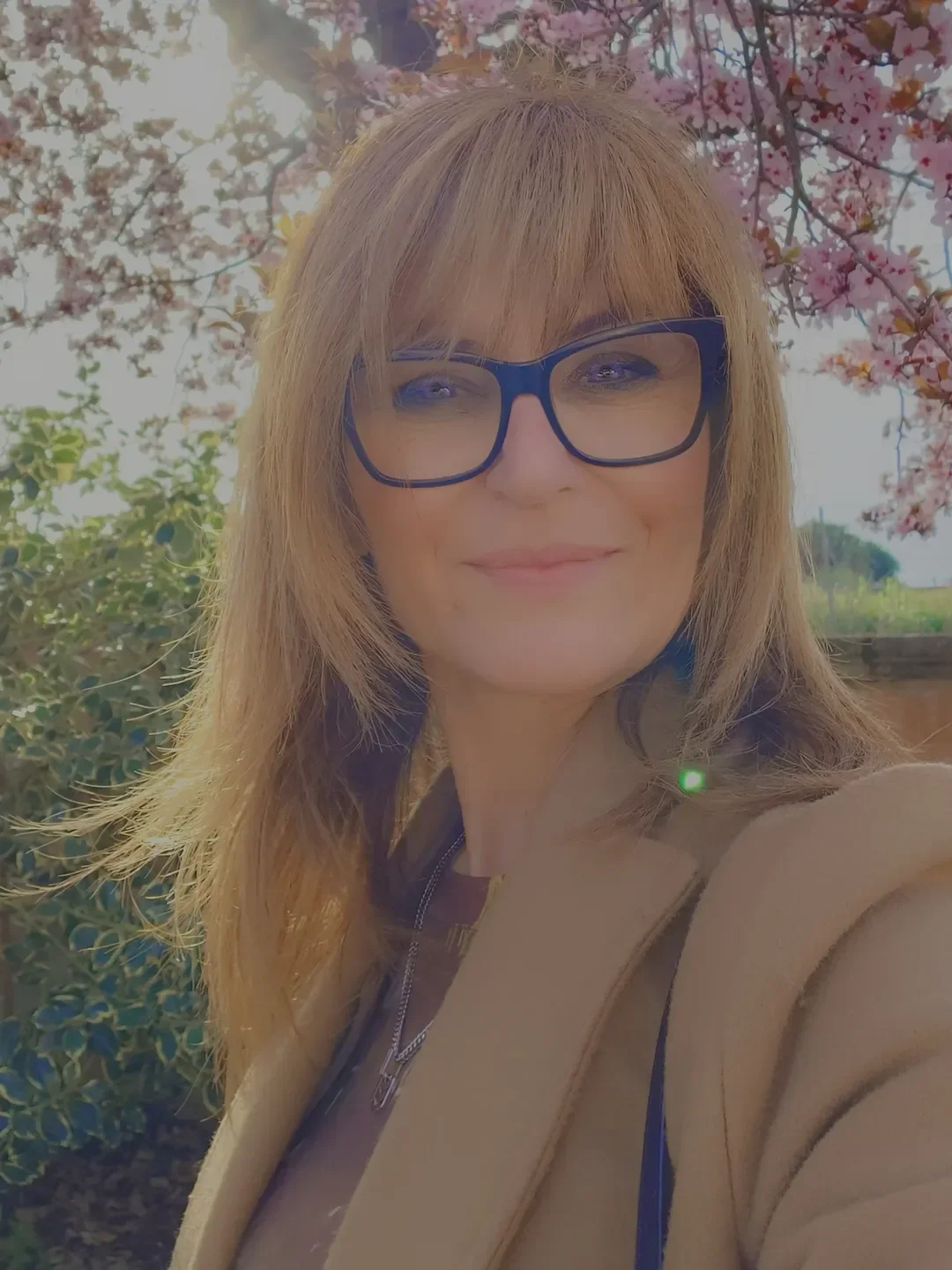 salon summer haircuts for women over 50 2026 Wispy Fringe and Honey Layers for a Softer Look