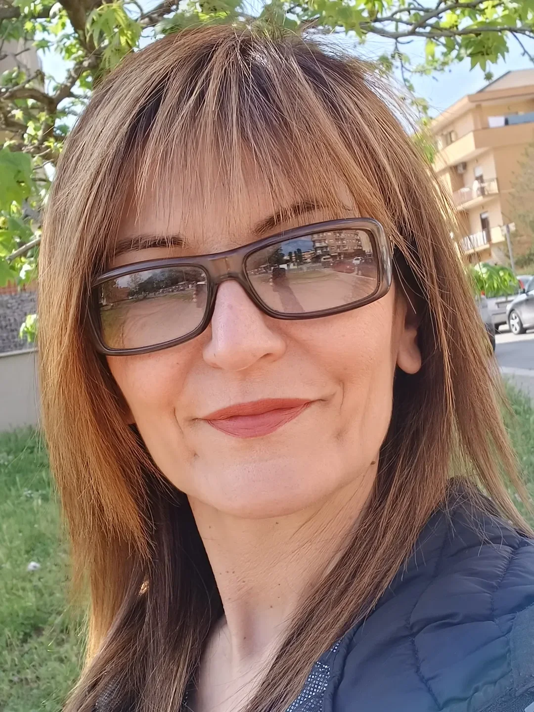 salon summer haircuts for women over 50 2026 Soft Straight Layers With Wispy Summer Bangs