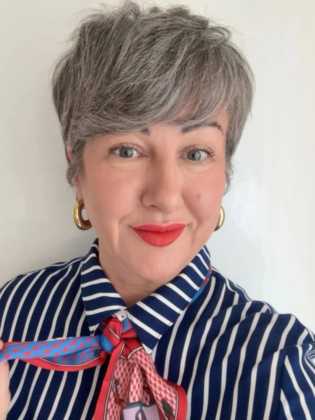 salon summer haircuts for women over 50 2026 Textured Silver Pixie With Modern Volume