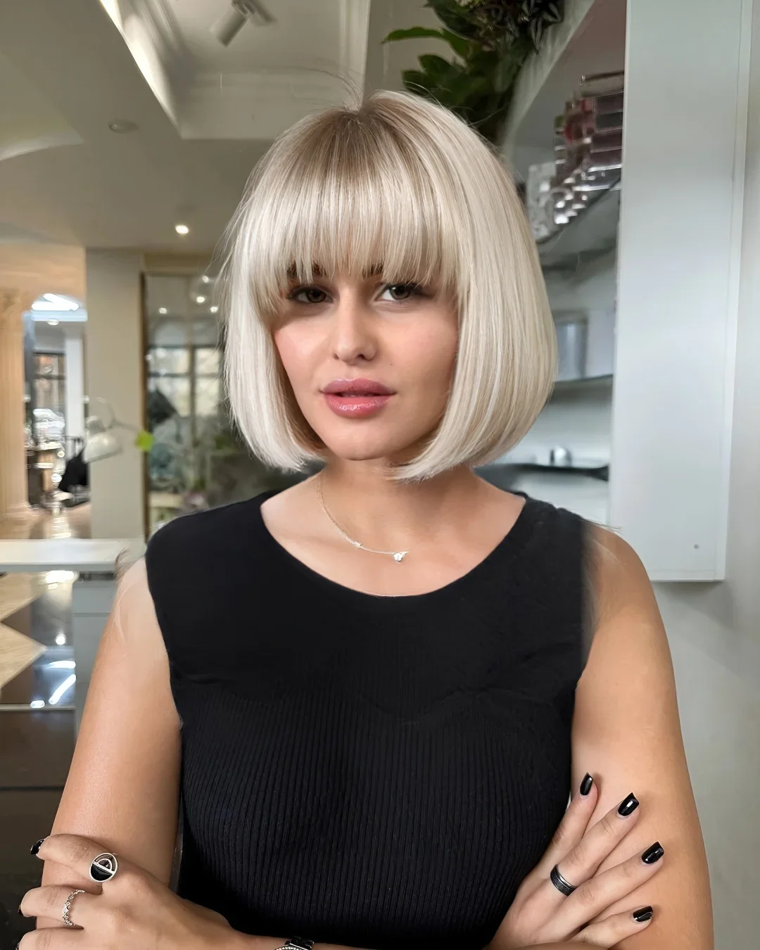salon summer haircuts with bangs 2026 French Vanilla Bob With Soft Precision Bangs