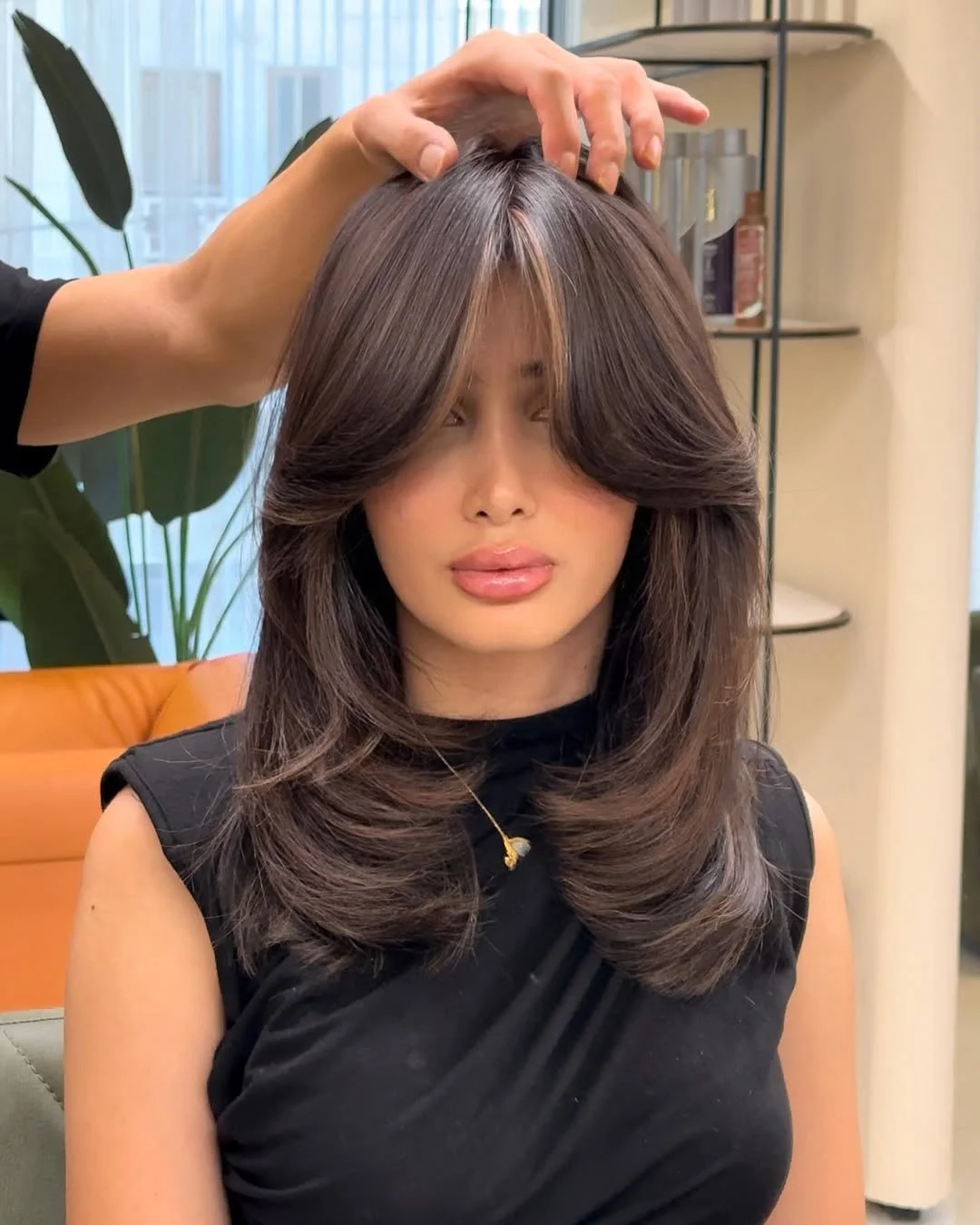 salon summer haircuts with bangs 2026 Voluminous Curtain Layers With Luxe Blowout Shape