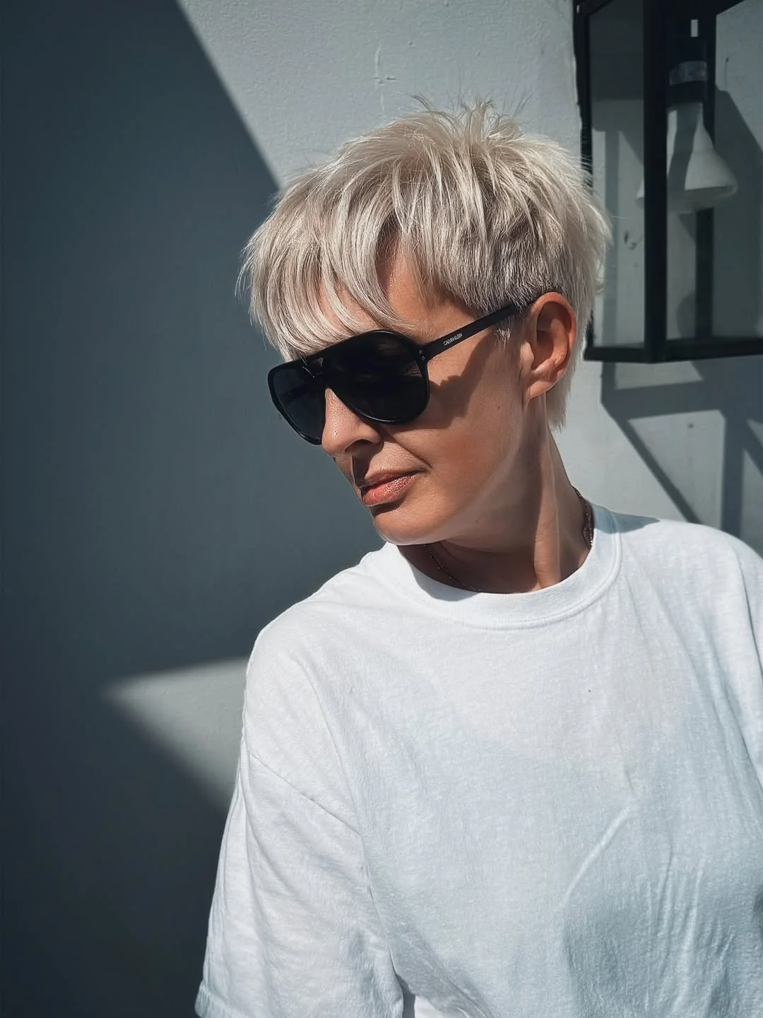 salon summer pixie haircuts 2026 Ice Blonde Pixie With Airy Volume