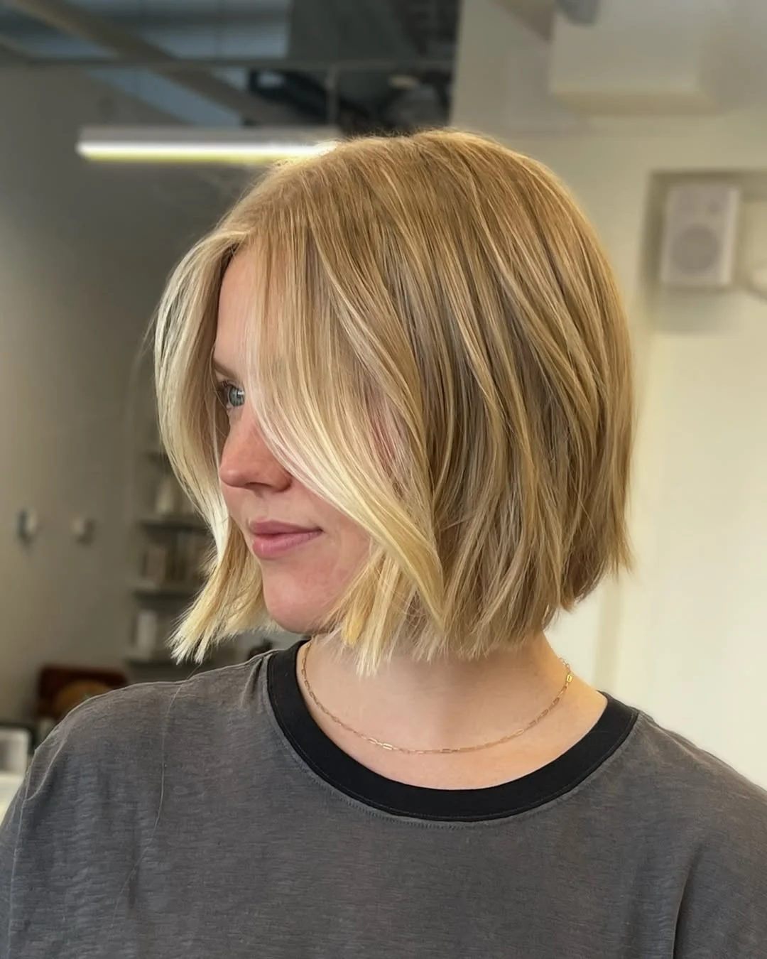 sassy summer short haircuts 2026 Soft Blonde Layered Bob with Face-Framing Lightness