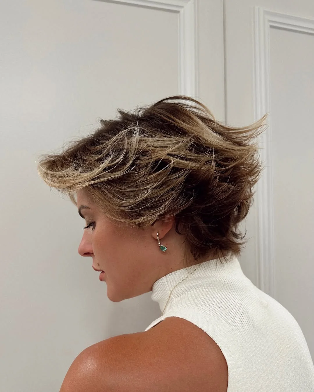 sassy summer short haircuts 2026 Layered Voluminous Pixie with Highlighted Texture