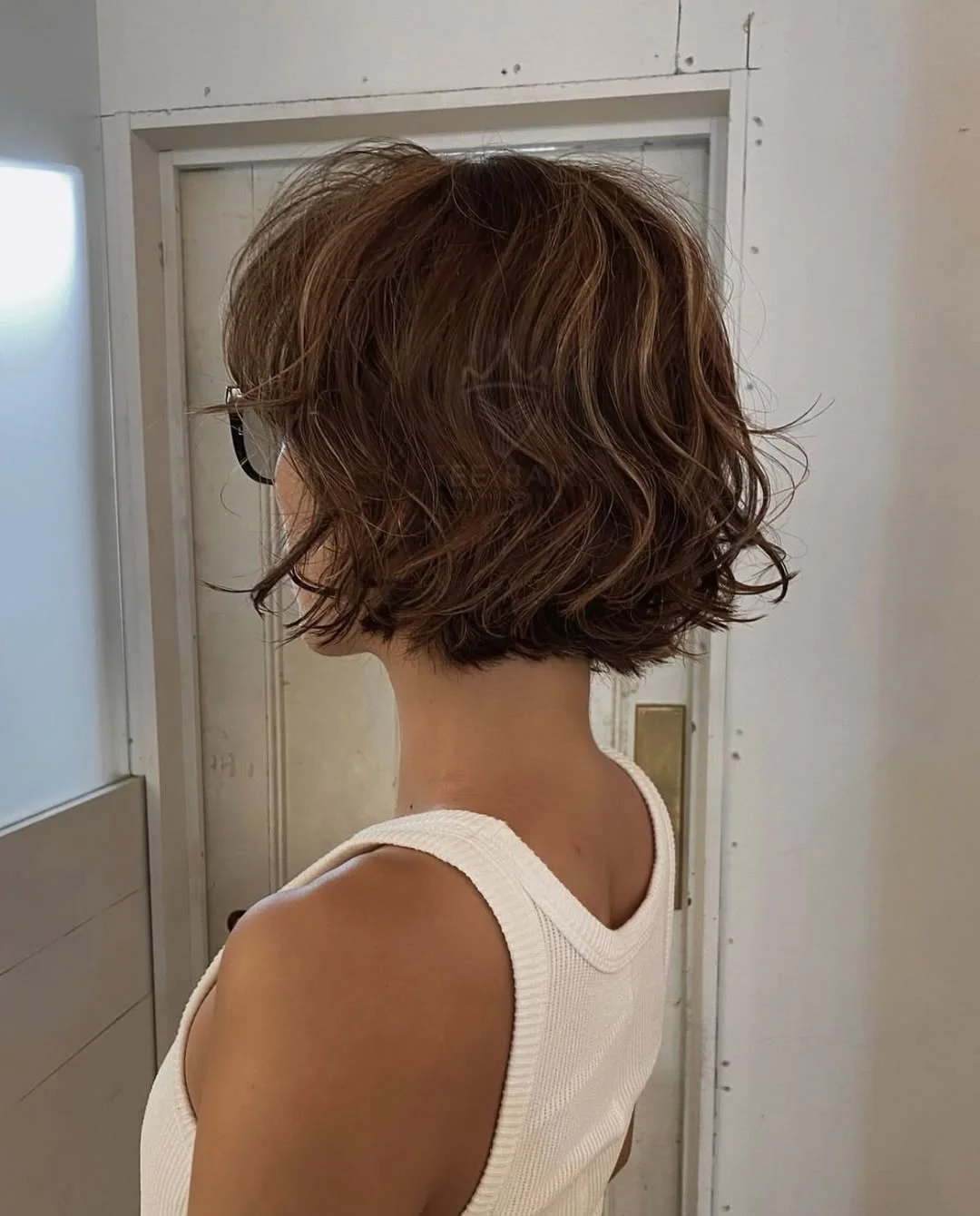 sassy summer short haircuts 2026 Wavy French Bob with Soft Volume