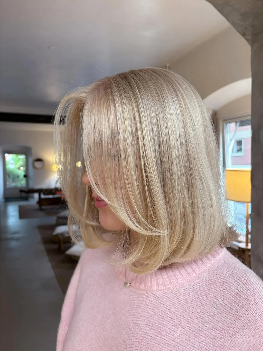 sassy summer short haircuts 2026 Airy Platinum Bob with Feathered Front