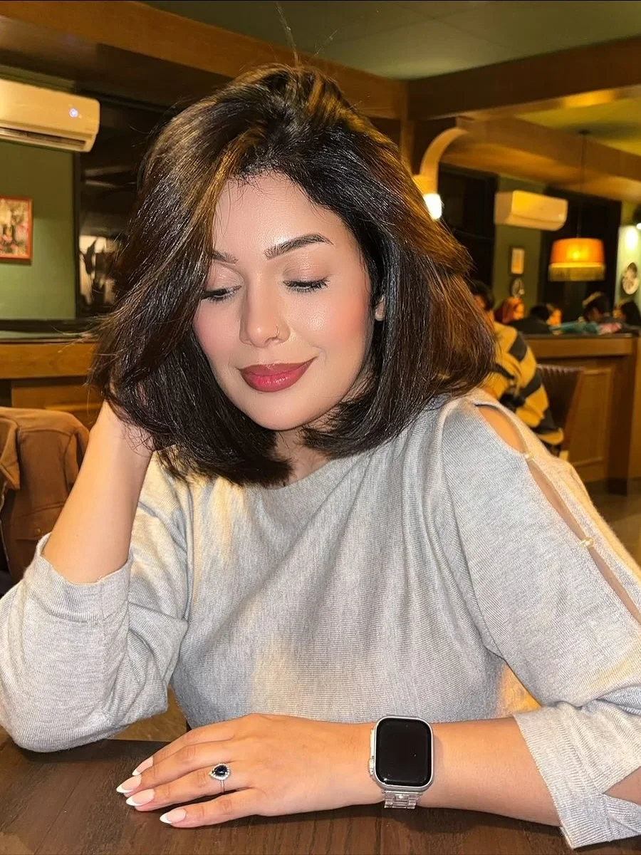 sassy summer short haircuts 2026 Glossy Dark Classic Bob with Side Volume