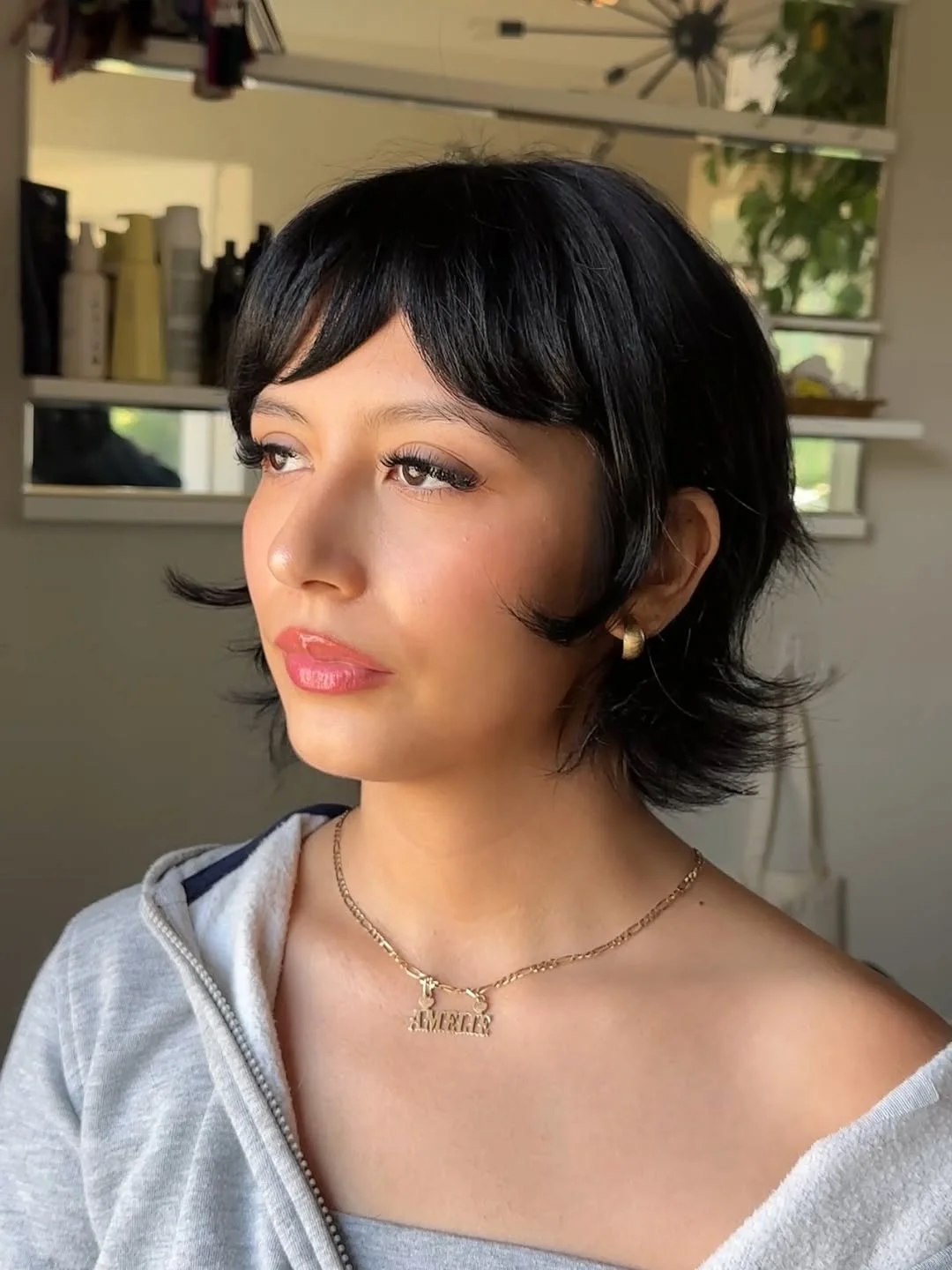 sassy summer short haircuts 2026 Edgy Layered Pixie with Wispy Bangs