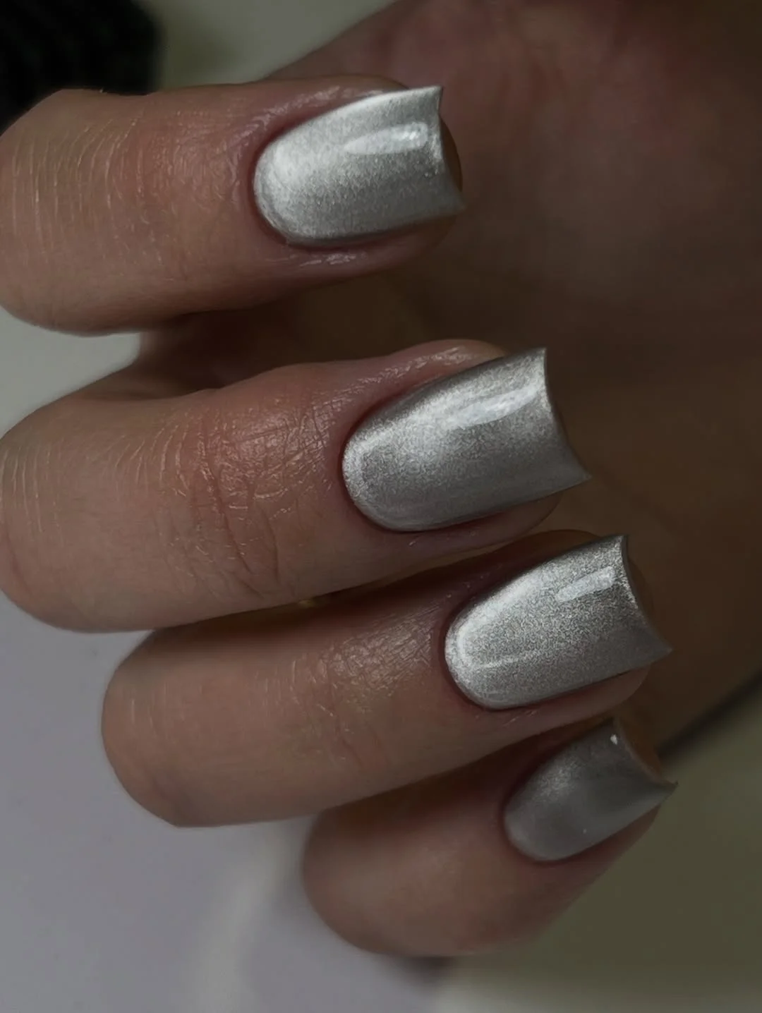 short gel nails summer 2026 Liquid Silver Chrome Nails for a Futuristic Summer Mood