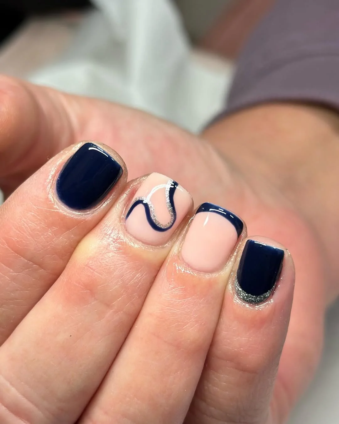 short squoval nails design 2026 Midnight Blue Swirls with Modern Graphic Details